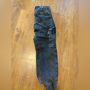 High waisted black Pacsun cargo pants, baggy fit with cinched ankle.